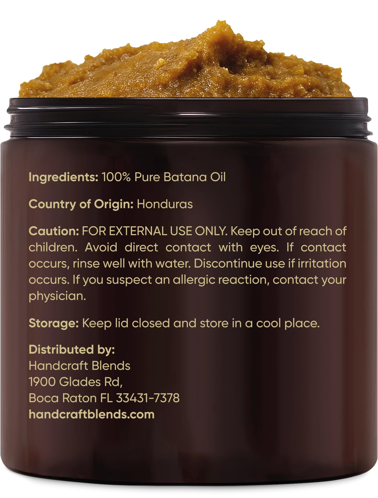 Warmed Handcraft Blends batana oil in hands ready to apply for deep hydration