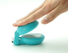 HARAC being operated with a palm press on table to reduce hand strain