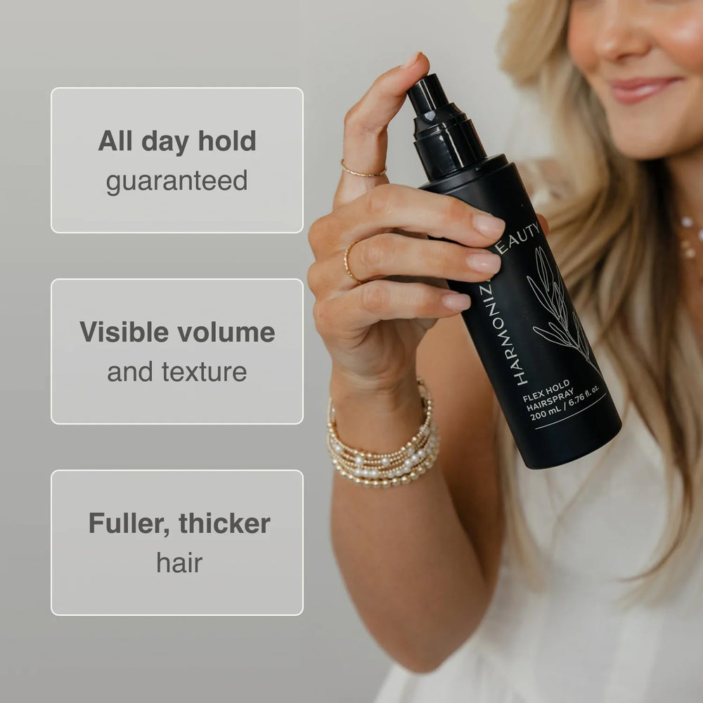 Harmonize Beauty spraying on styled hair demonstrating flexible hold