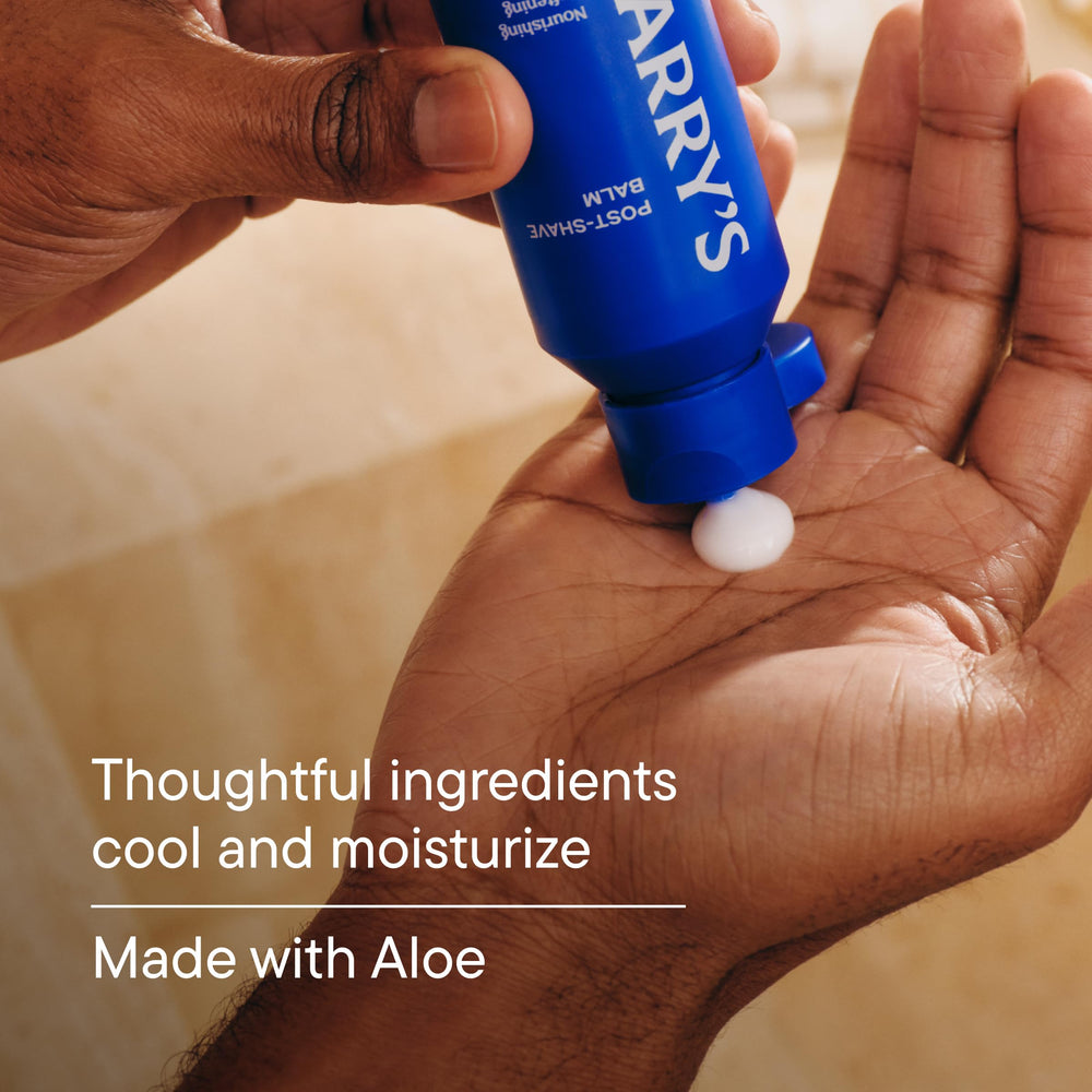 Applying Harry's balm to jawline, soothes and calms skin after shaving