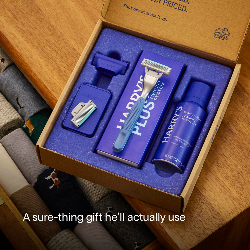 Harry's kit flat lay displaying handle, cartridges, gel, and cover