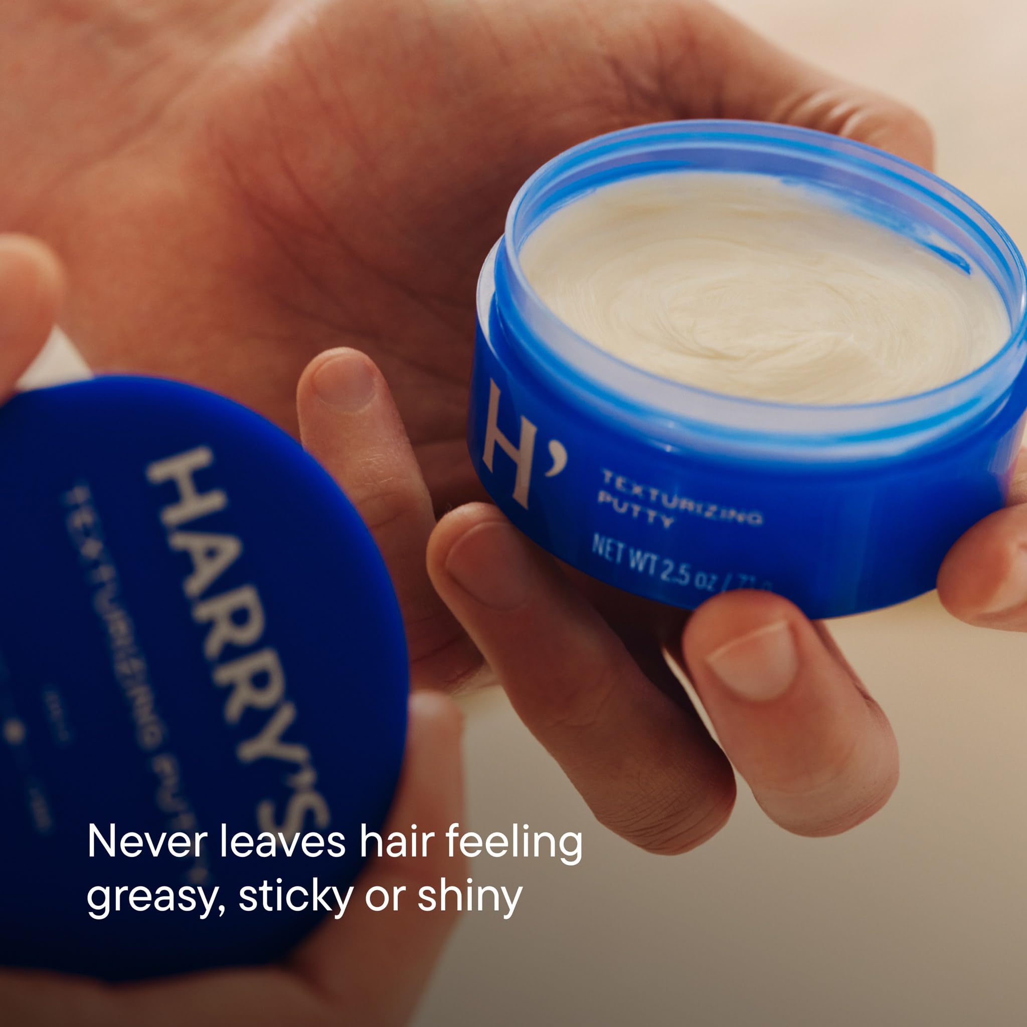 Harry's close-up of putty texture highlighting malleable, matte styling finish