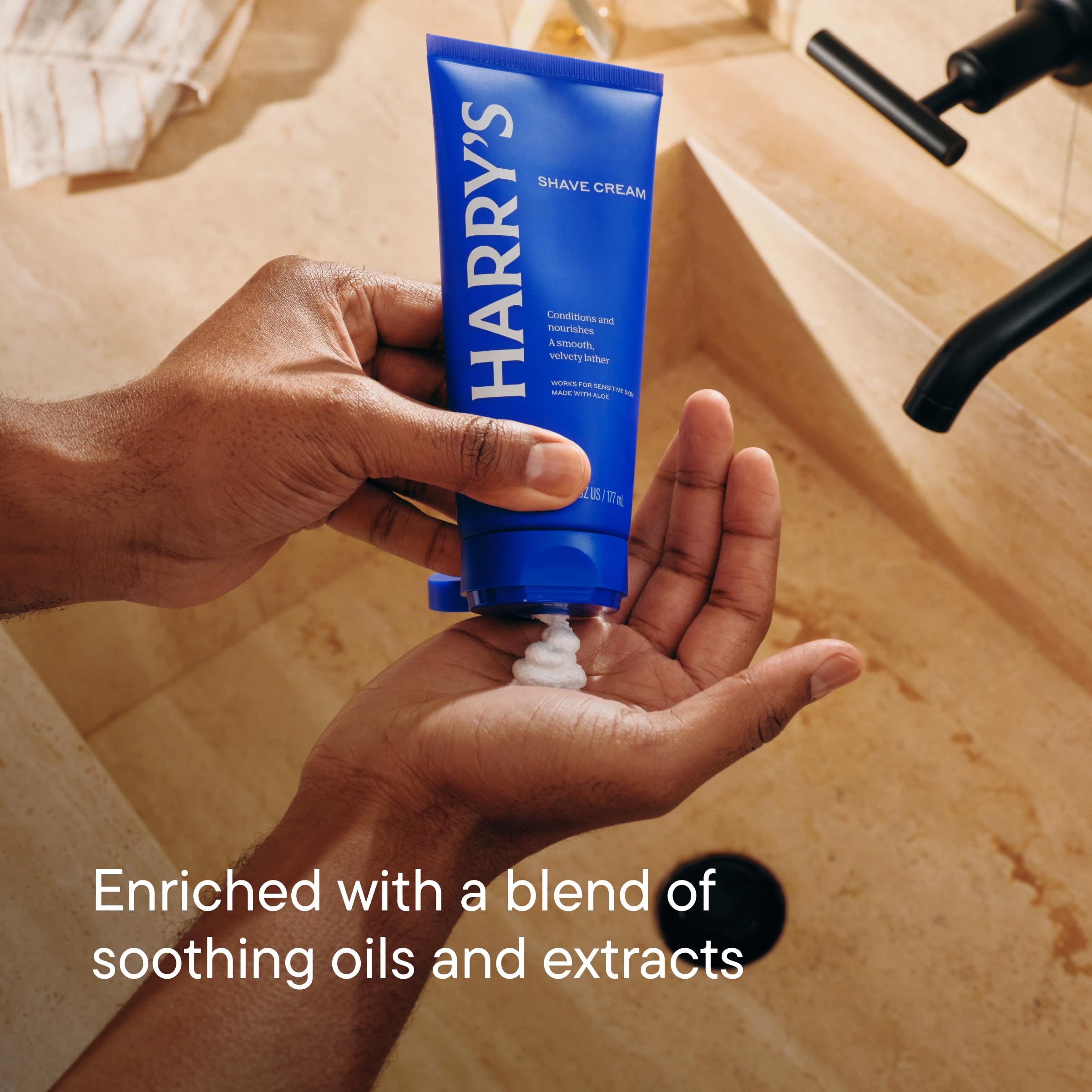 Harry's shave cream lather on hand highlighting cushion and hydration