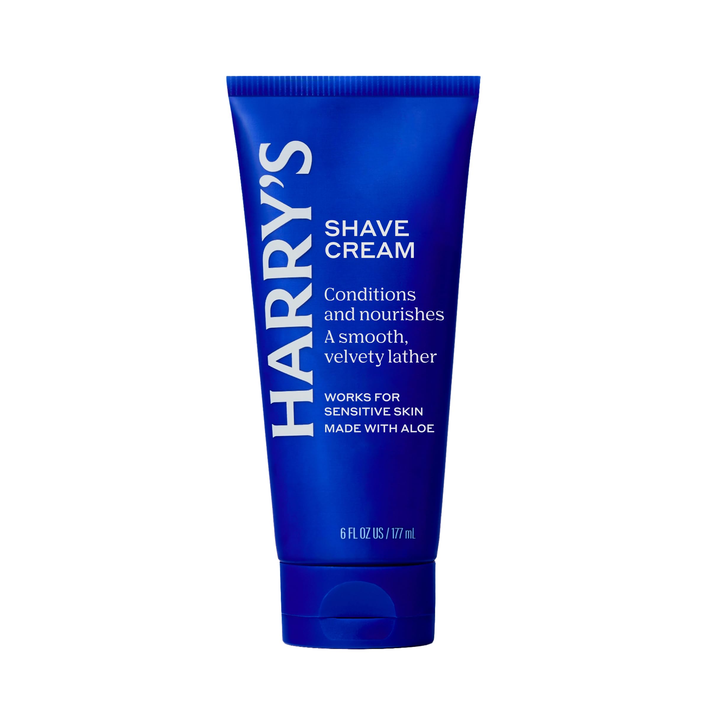 Harry's shave cream being used to outline beard for accurate styling