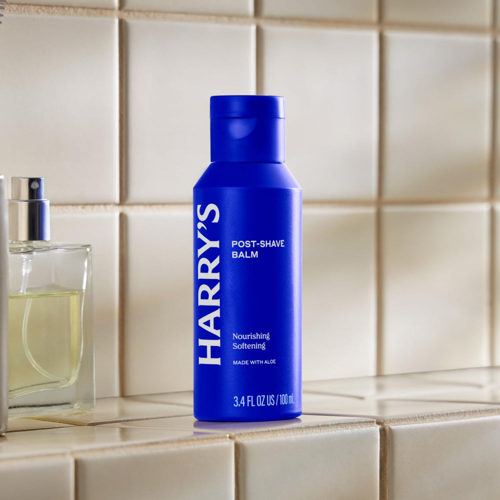 Harry's balm texture on fingertip, demonstrates quick-absorbing, non-greasy feel