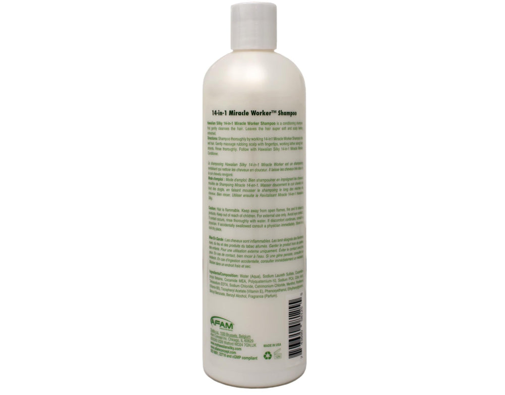 Hawaiian Silky bottles next to a hand to show true 16 fl oz scale