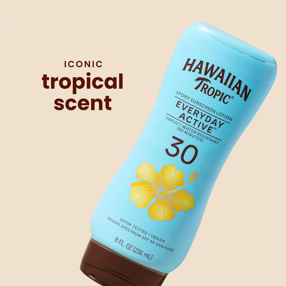 Hawaiian Tropic sunscreen being applied to forearm demonstrating non-greasy finish