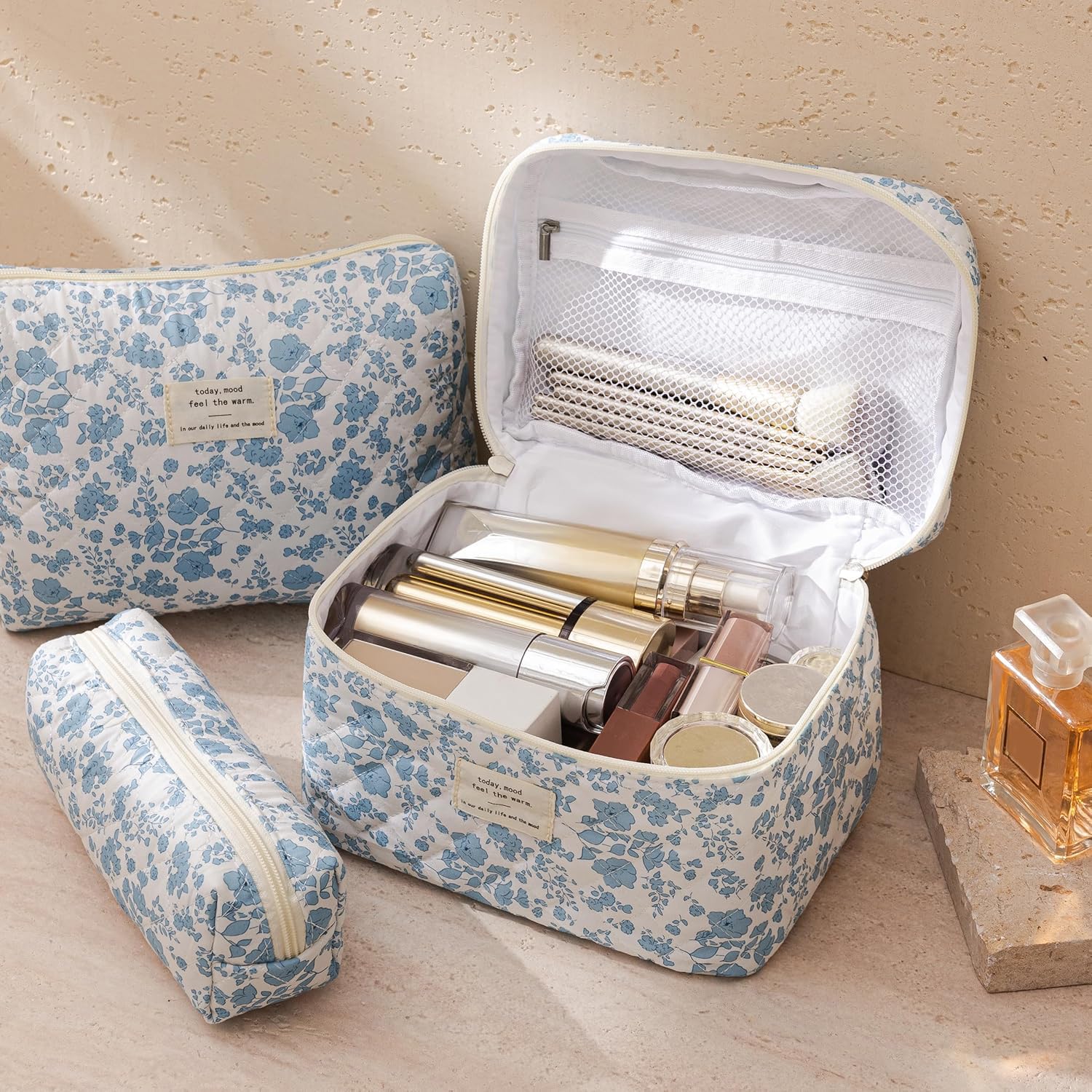 HBselect medium bag open to display interior space and organized cosmetics