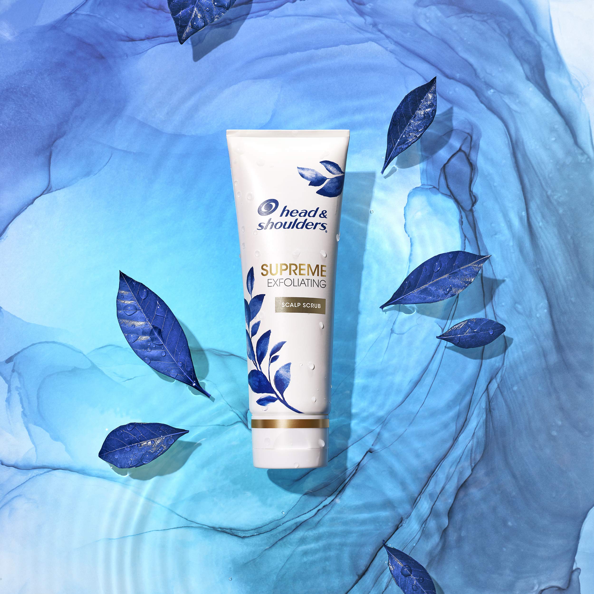 Hand holding jar to show Head & Shoulders product size and portability