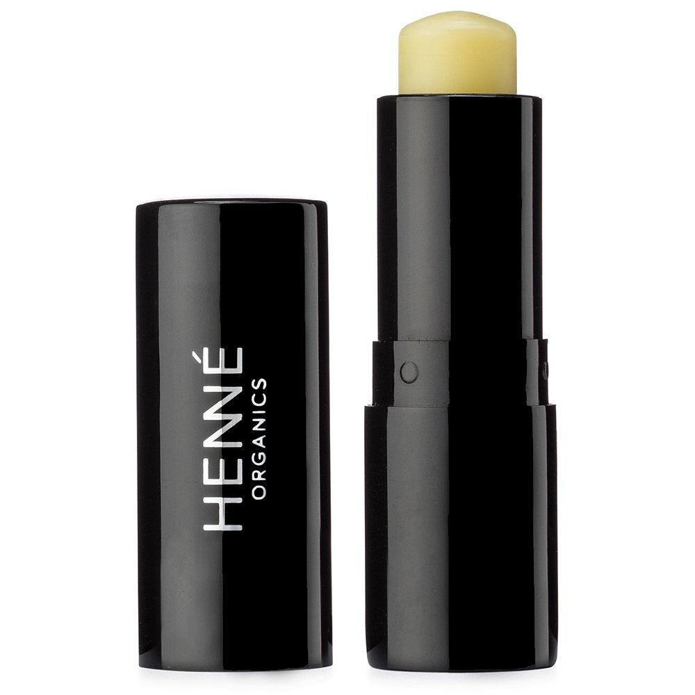 Henné Organics front tube showing sleek black packaging and portable benefit