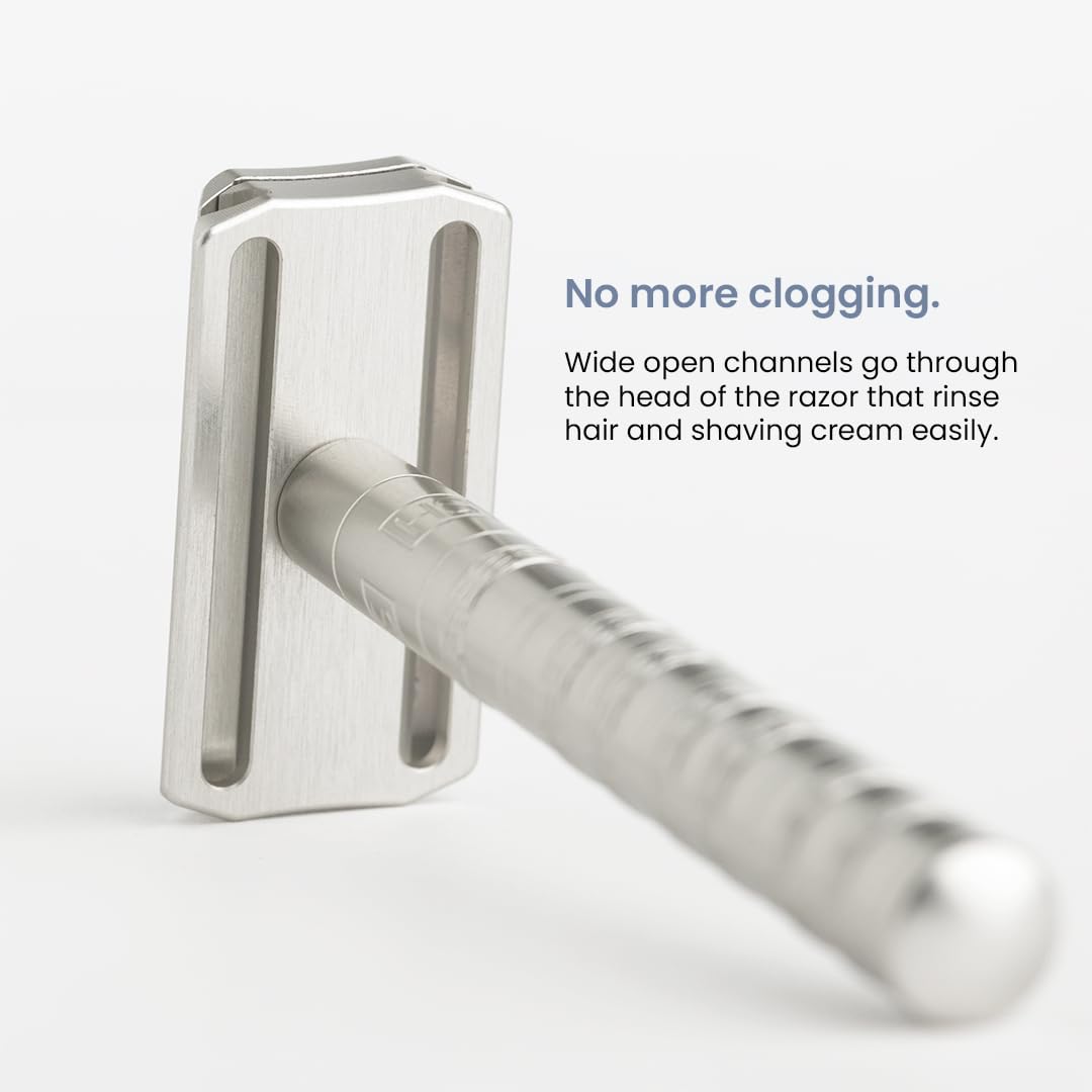 Henson Shaving five spare blades beside razor highlighting low-cost replacement advantage