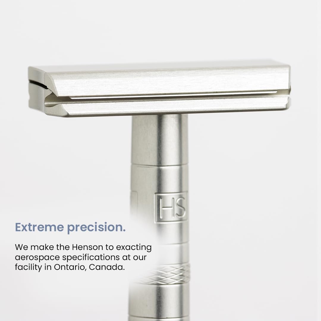 Henson Shaving side profile of steel blue head highlighting short free-end rigidity