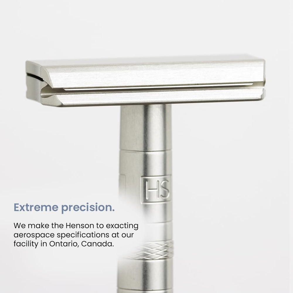 Henson Shaving side profile of steel blue head highlighting short free-end rigidity