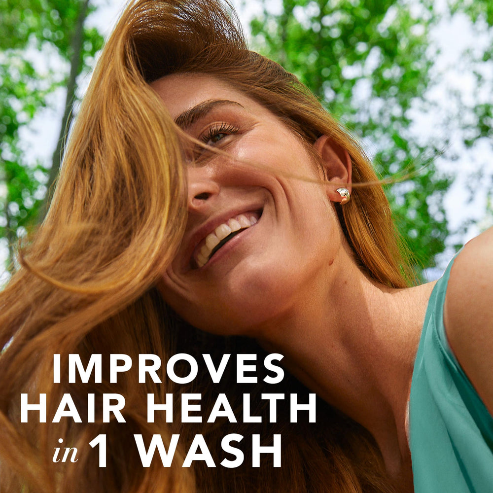 Herbal Essences trio styled on bathroom shelf conveying daily routine ease