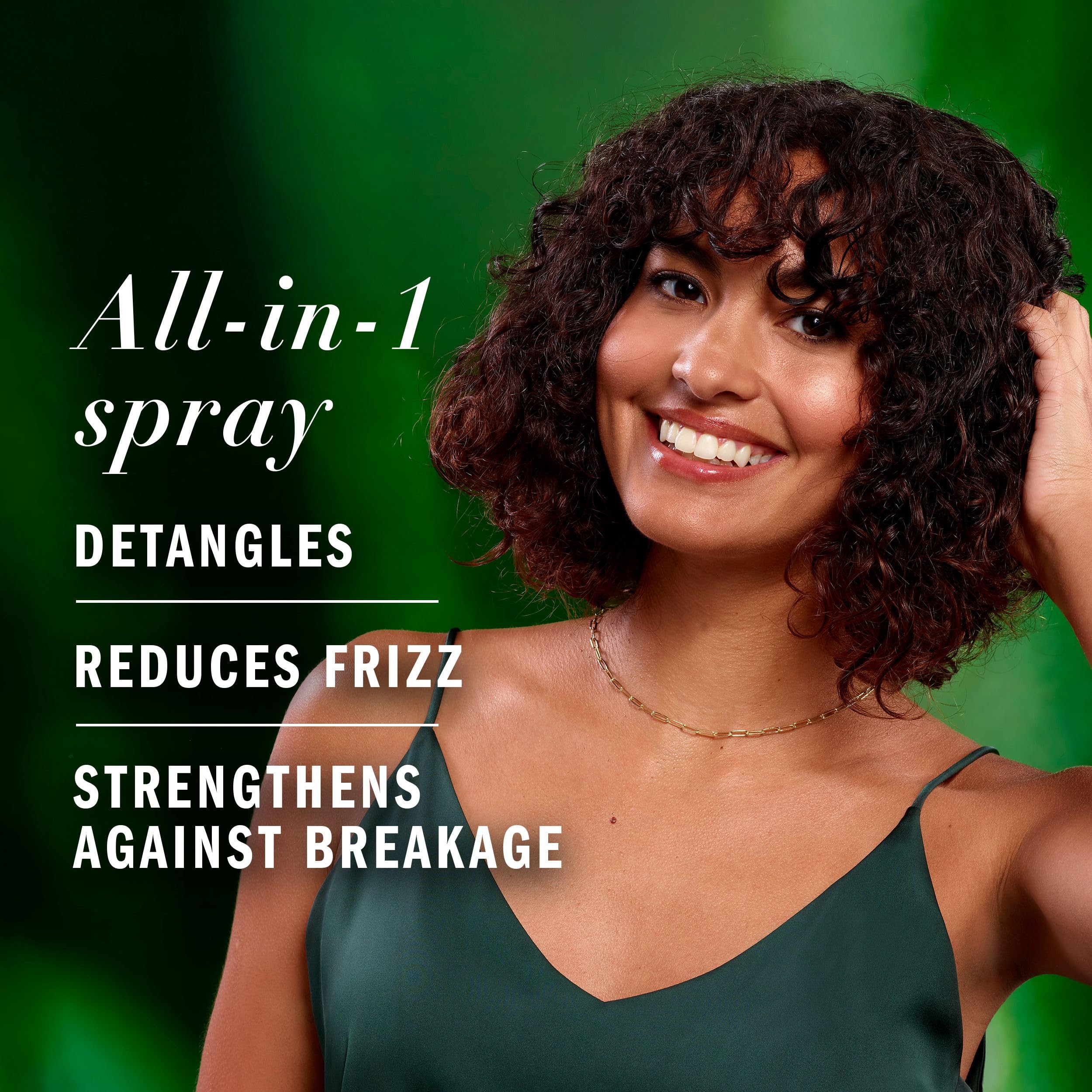 Herbal Essences nourishing spray mist in hand offering quick absorption