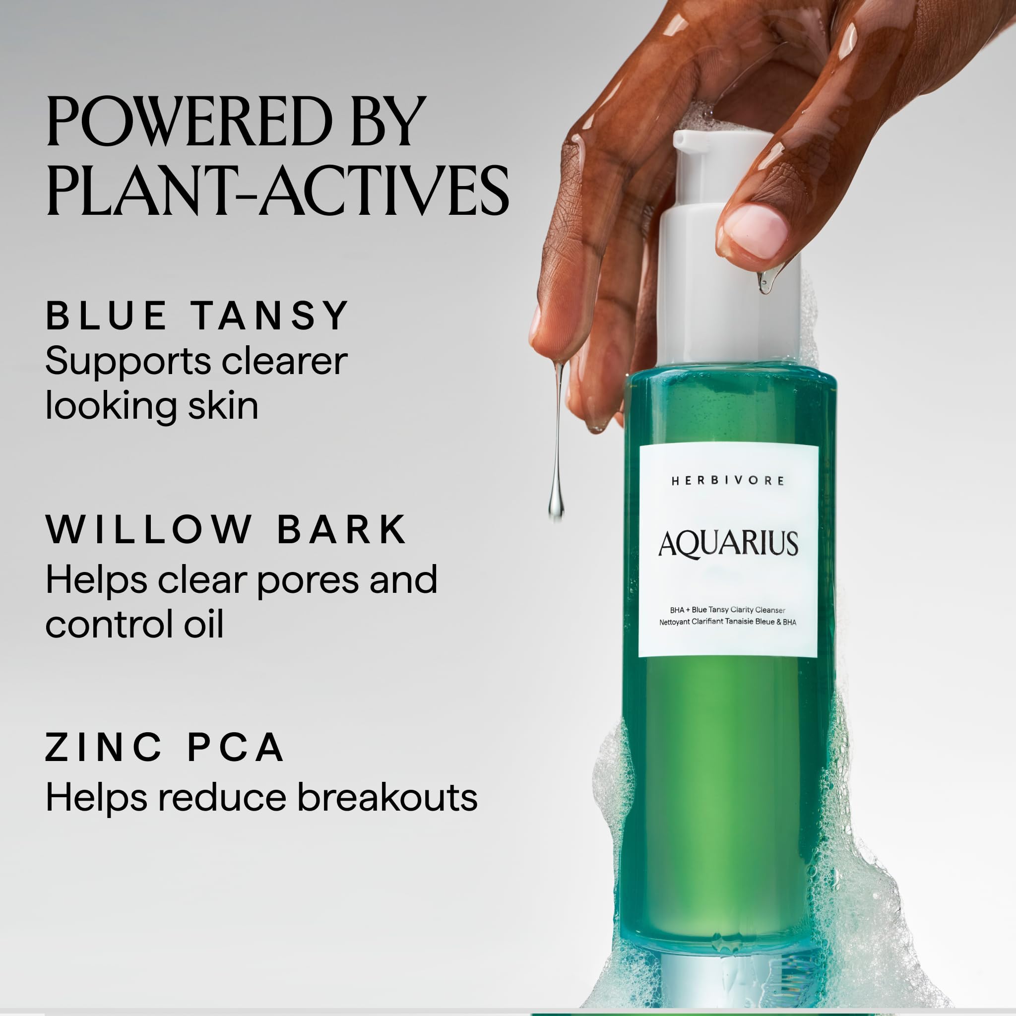 HERBIVORE Aquarius foamy lather in hand demonstrating easy rinse-off