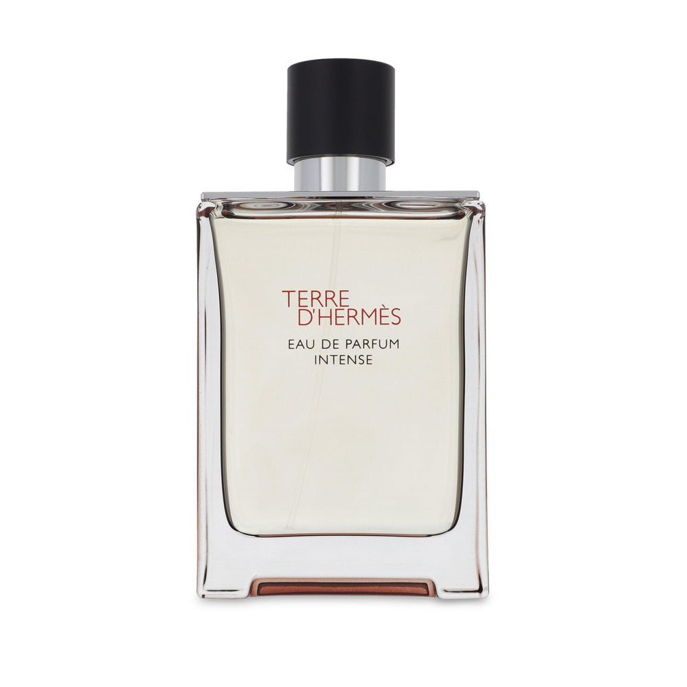 Hermès bottle close-up highlighting cap and glass texture for refillable benefit