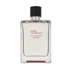Hermès bottle close-up highlighting cap and glass texture for refillable benefit