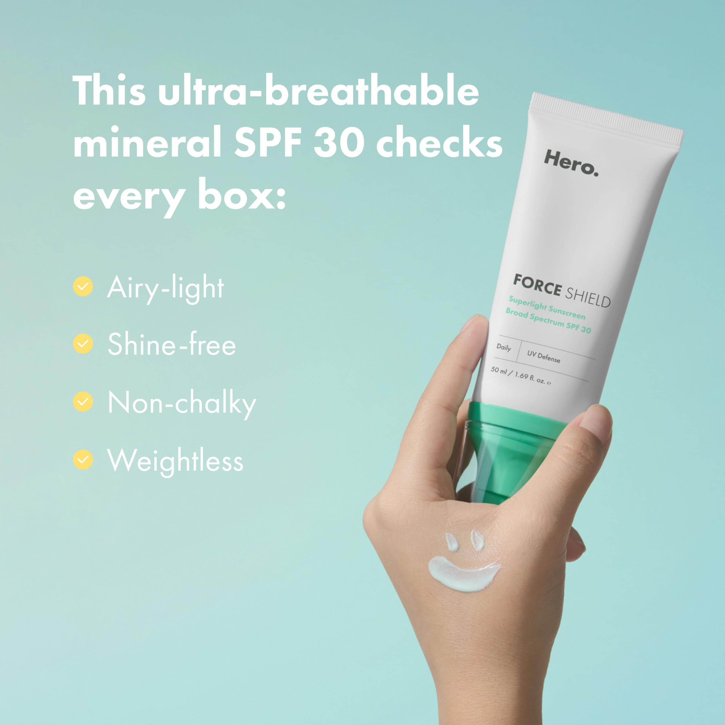 Hand applying Hero Cosmetics Force Shield on back of hand, demonstrating fast-absorbing finish