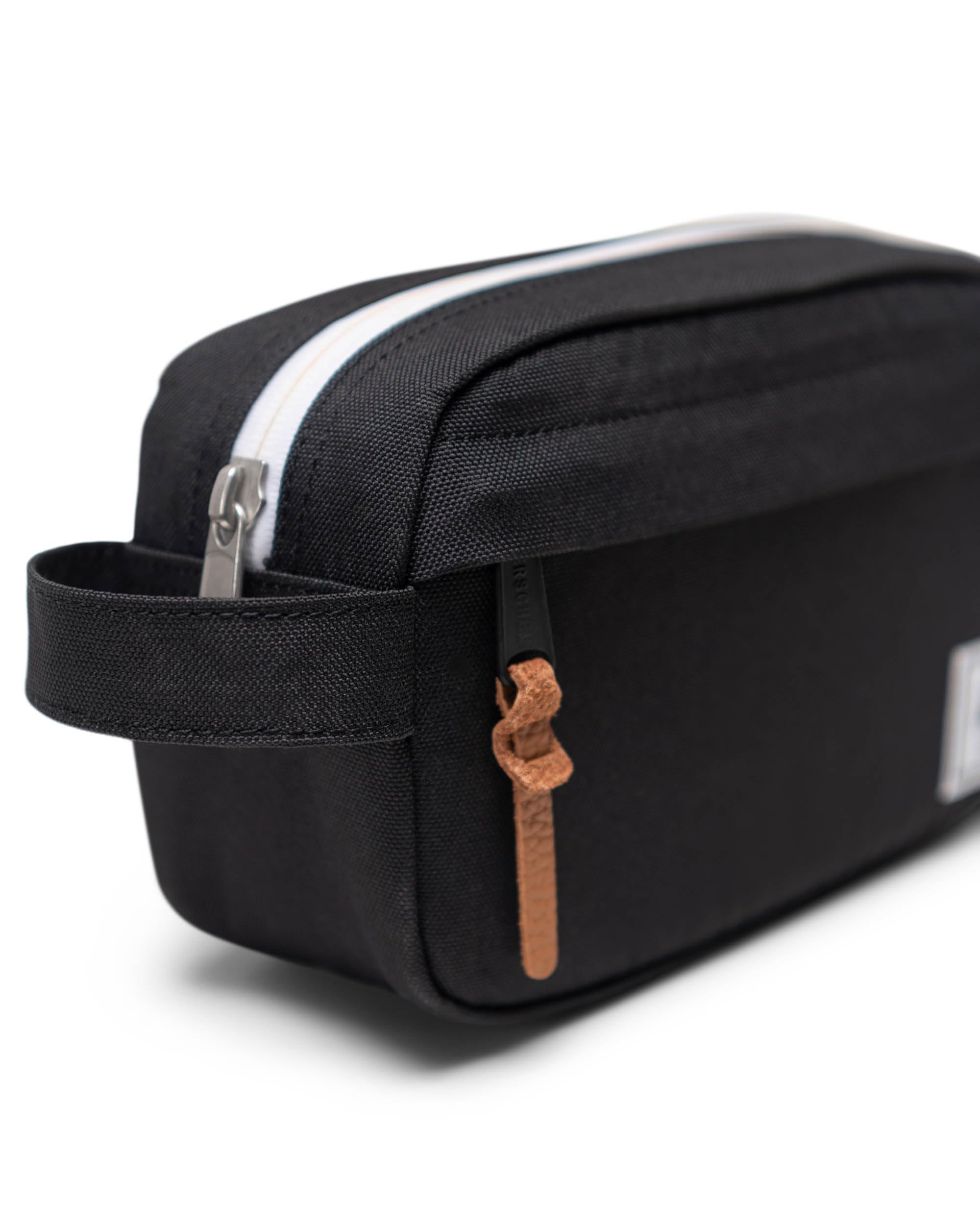 Herschel held in hand illustrating size and grab-and-go portability
