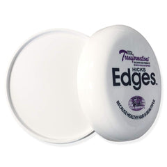 Hicks smoothing edges with comb showing precise styling benefit