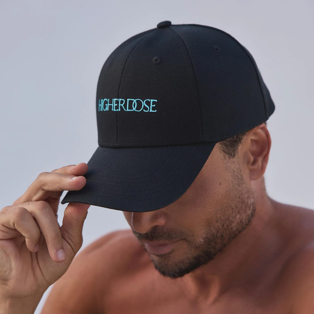 HigherDOSE hat in hand showing size and portability benefit