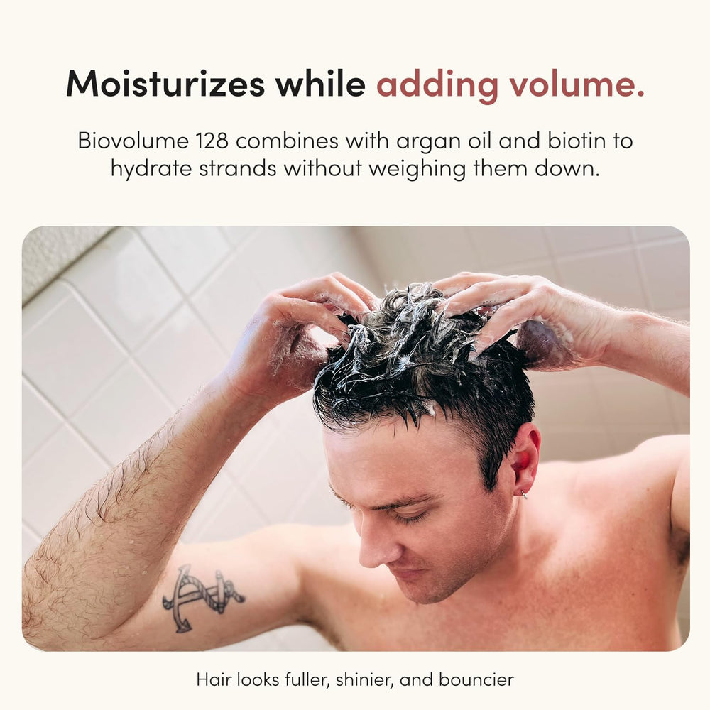 hims conditioner being poured to show creamy consistency and easy application