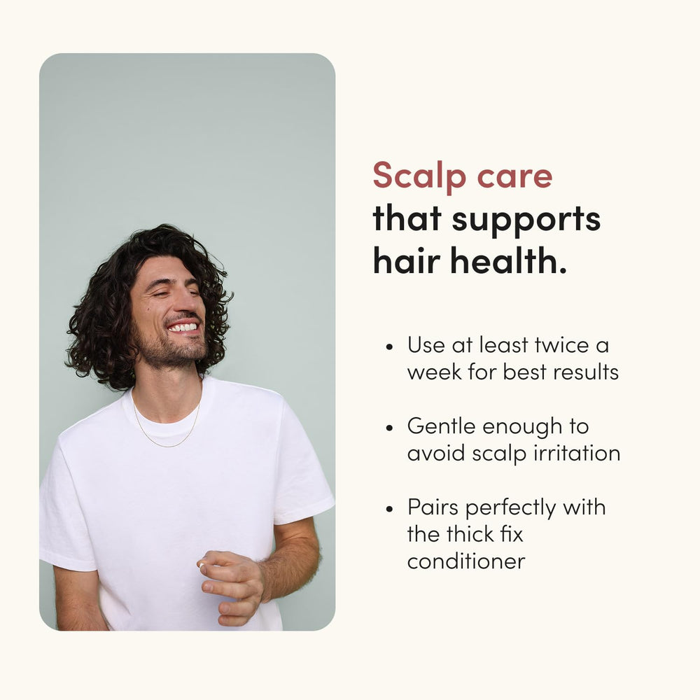 hims product in hand being applied to scalp for targeted treatment