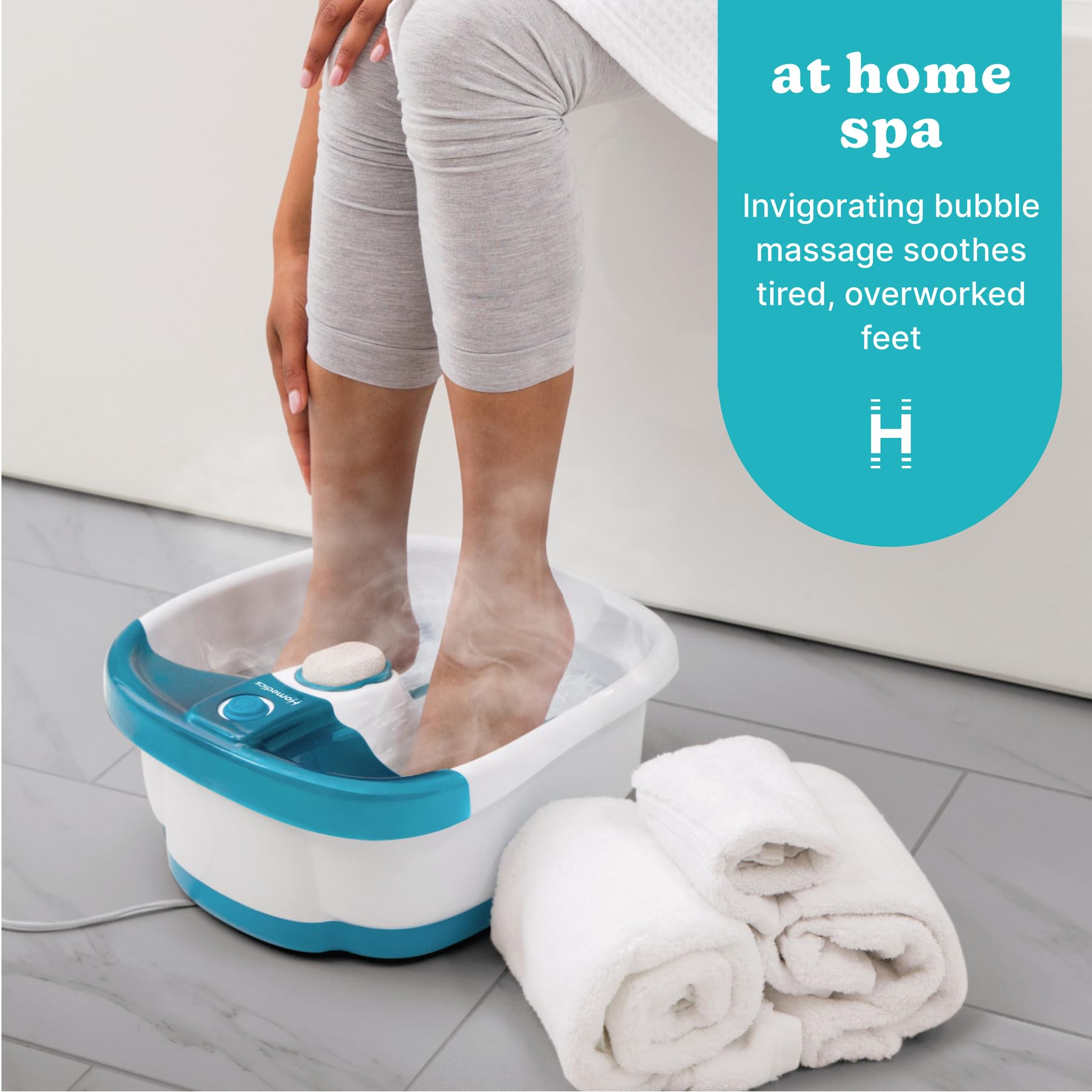 HoMedics top view open basin highlighting textured nodes and splash guard for comfortable soaks