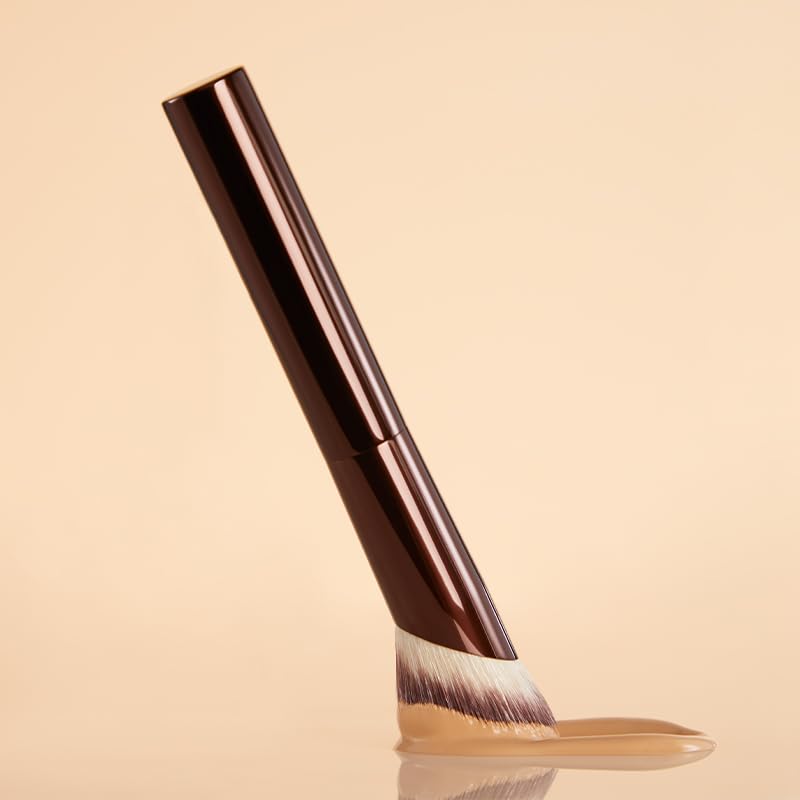 Hourglass brush with packaging and label highlighting vegan cruelty-free fibers