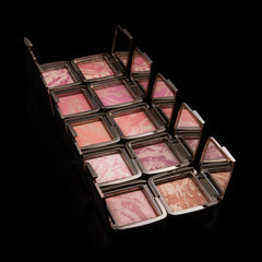 Hourglass application on model cheeks demonstrating radiant flush that enhances complexion
