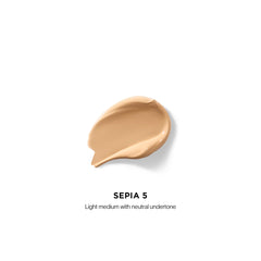 Hourglass applicator closeup highlighting precise application and easy blending benefit
