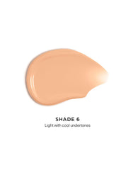 Hourglass skin tint creamy texture close-up showing smooth blendability benefit