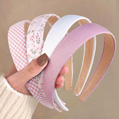 Huachi front view of four headbands showing colors and packaging, convenient set