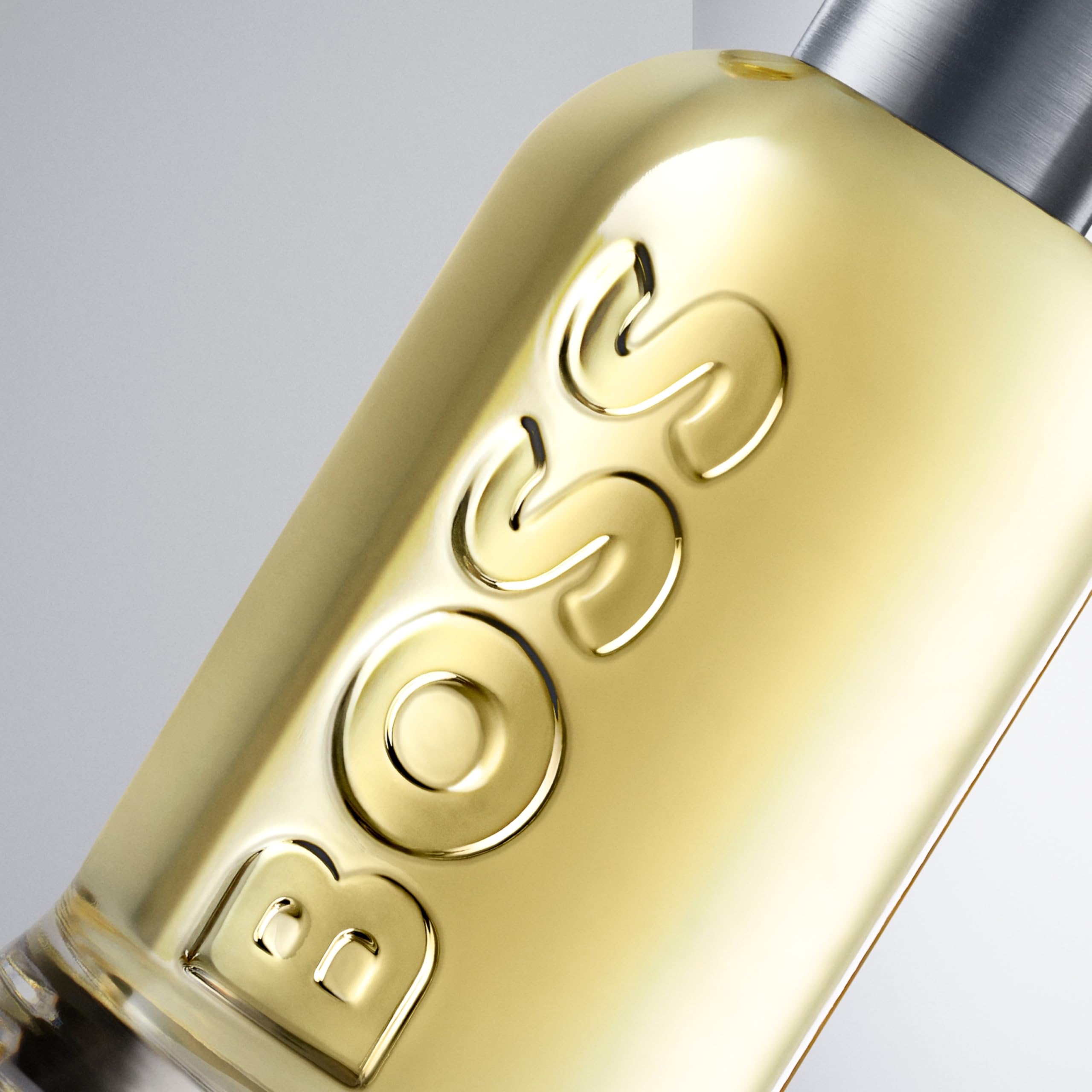 Hugo Boss Bottled on a shirt cuff in lifestyle scene, portrays refined casual wear