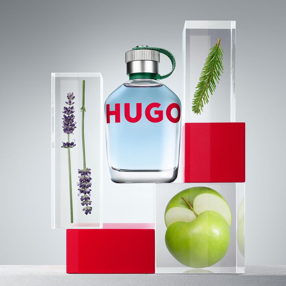 Hugo Boss HUGO Man being sprayed on wrist for immediate fresh aromatic boost