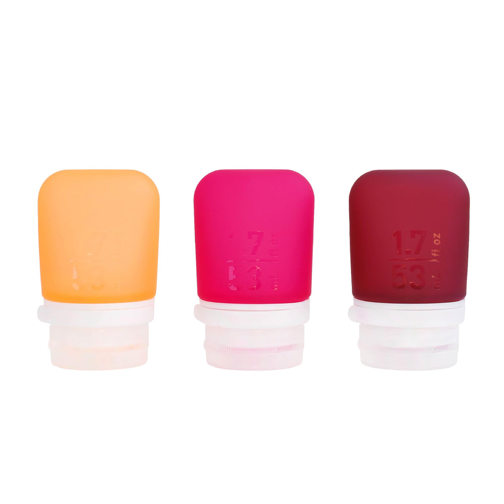 humangear GoToob+ front view showing three colored bottles and compact design for travel
