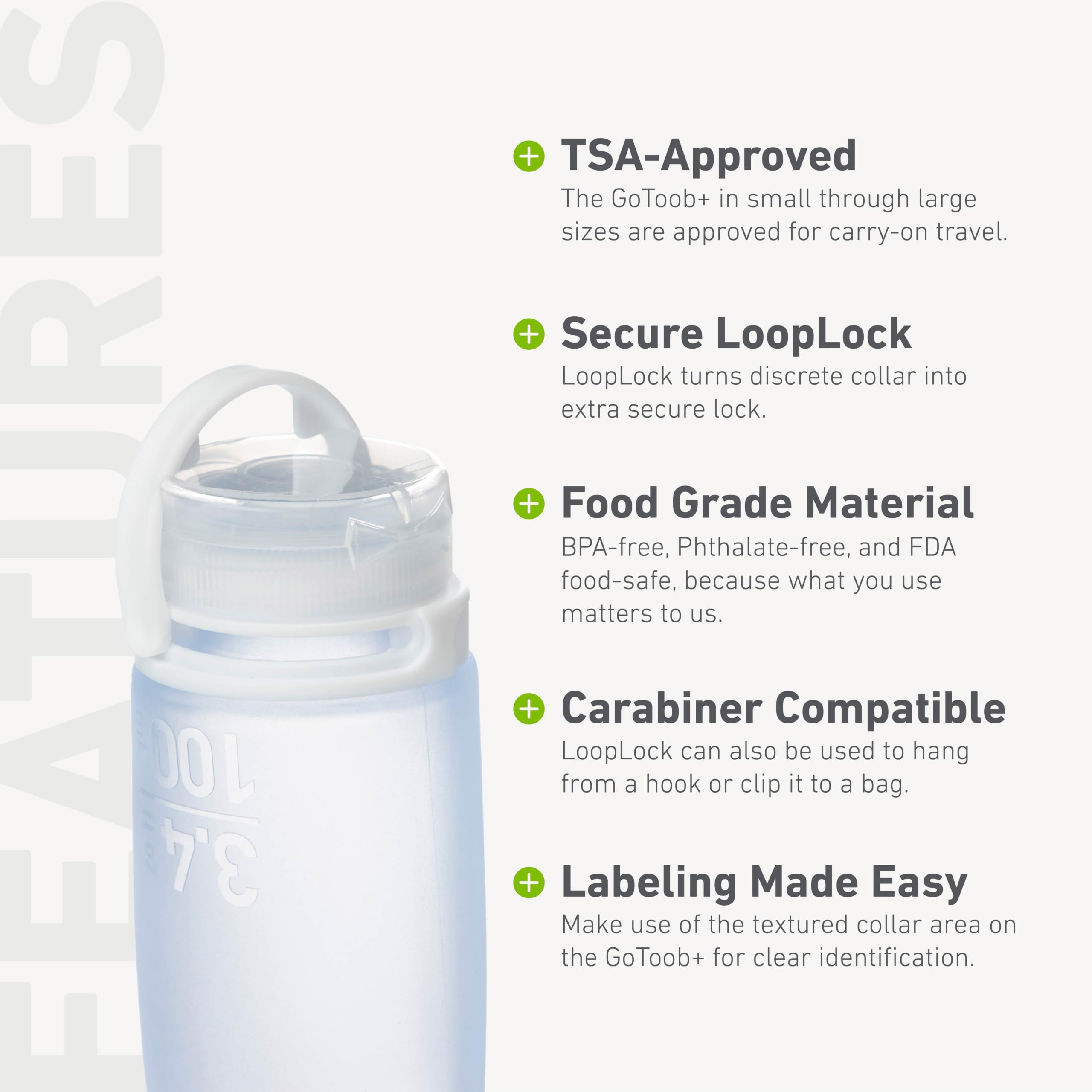 humangear GoToob+ in hand filled to 2.5 fl oz showing portable convenience