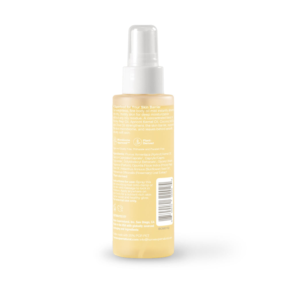 HUME SUPERNATURAL bottle styled with coconuts for fresh beach fragrance
