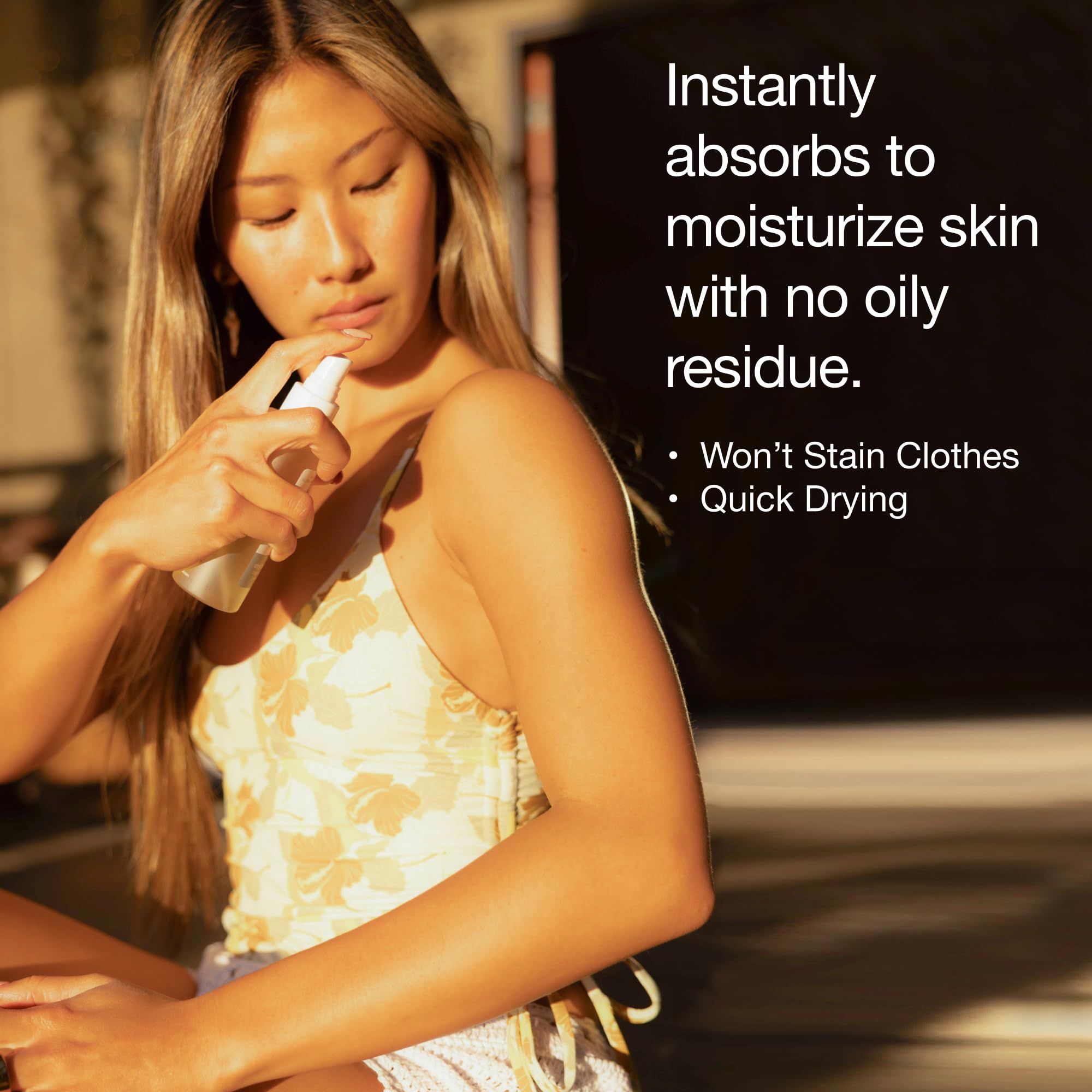 HUME SUPERNATURAL mist spraying from bottle, shows fast-absorbing application benefit