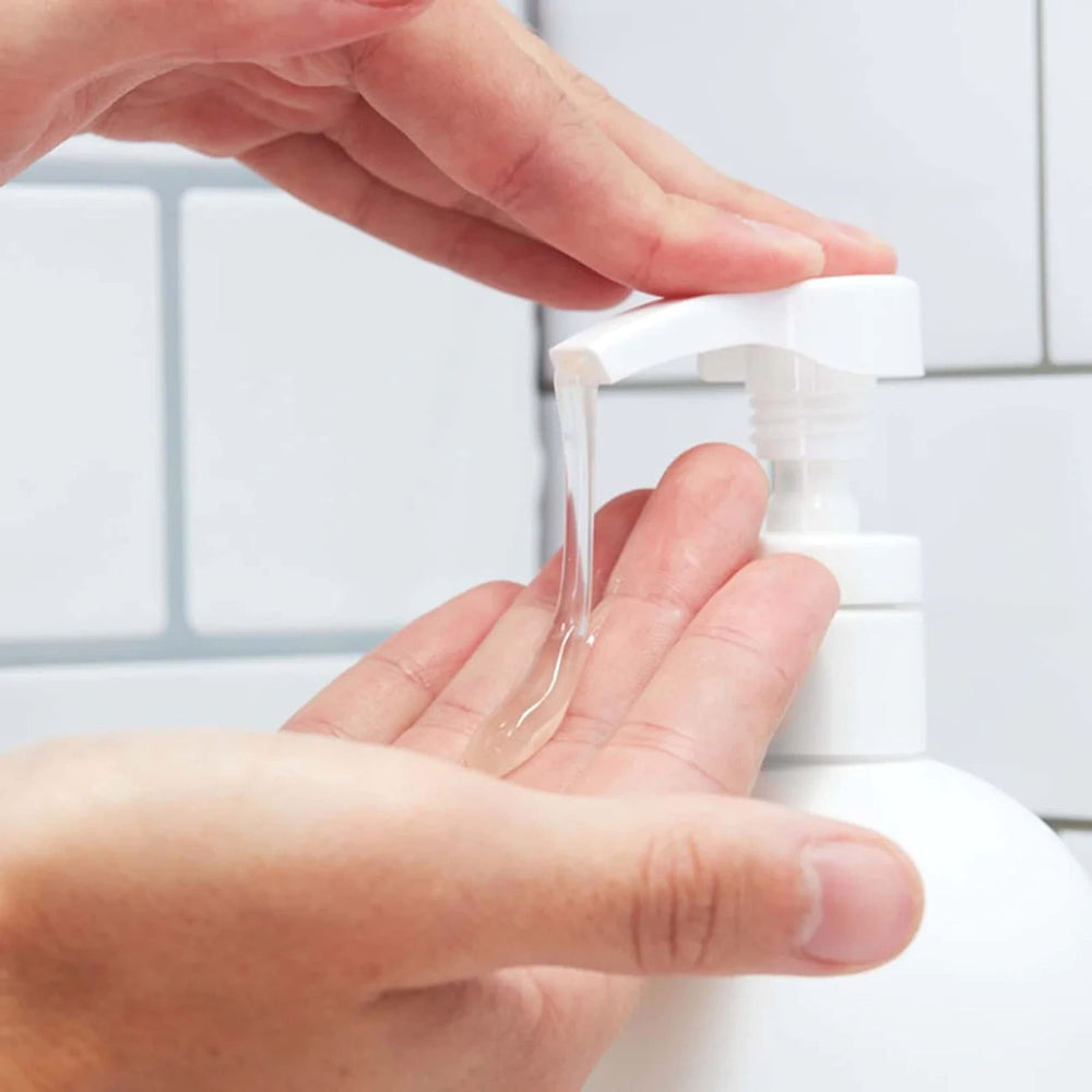 Huron in-shower lifestyle shot showing use after workout for refreshment