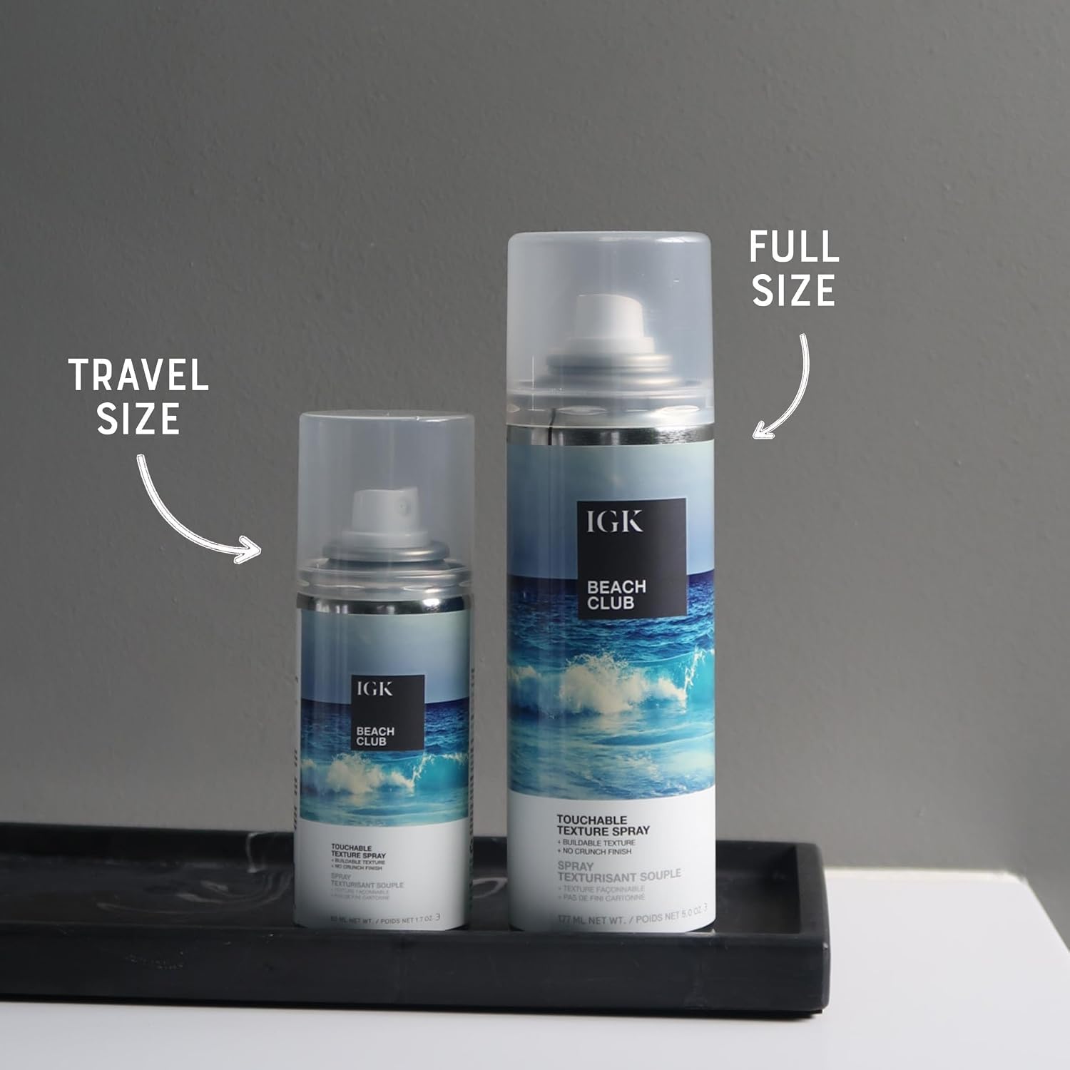 IGK close-up texture mist visible on hair strands, enhances grip and definition benefit