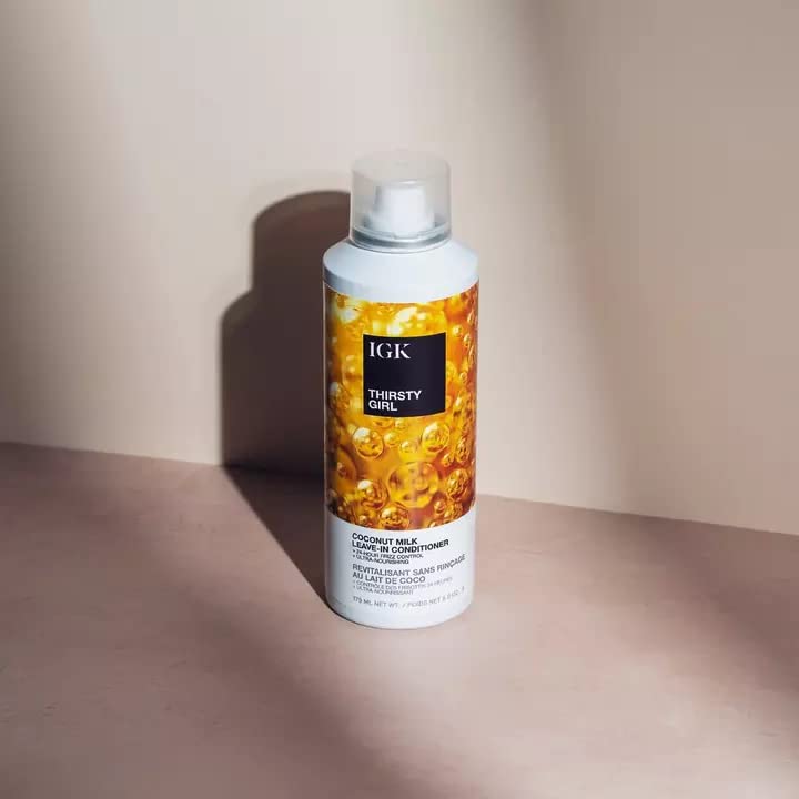 IGK Thirsty Girl in hand for scale highlighting travel-friendly 5 oz size benefit