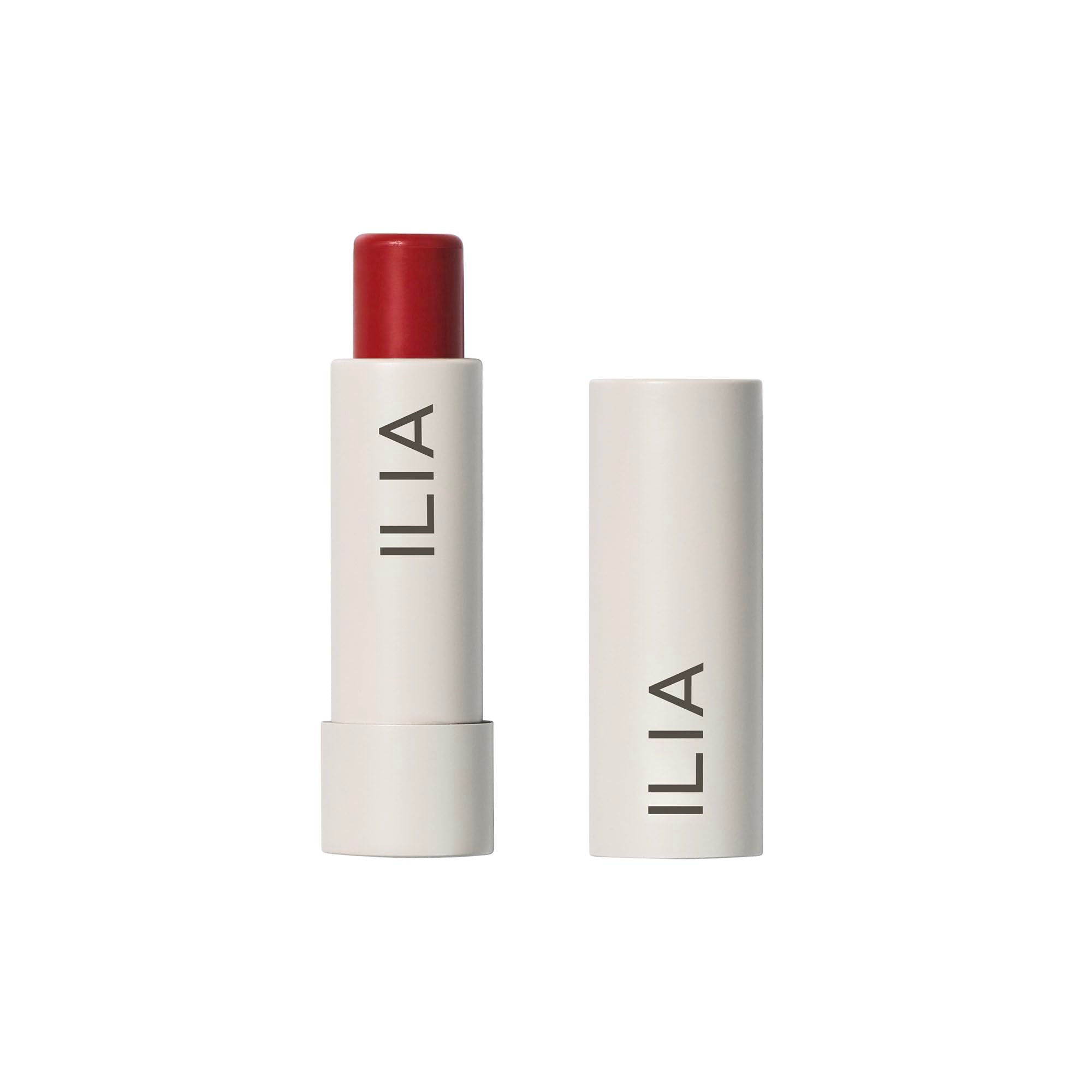 ILIA front packaging of Balmy Tint Heartbeats showing compact tube and warm-red shade benefit: easy carry