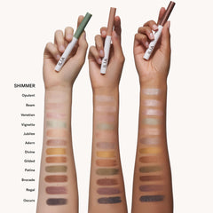 ILIA swatch on arm of Beam peach-pink showing buildable color payoff