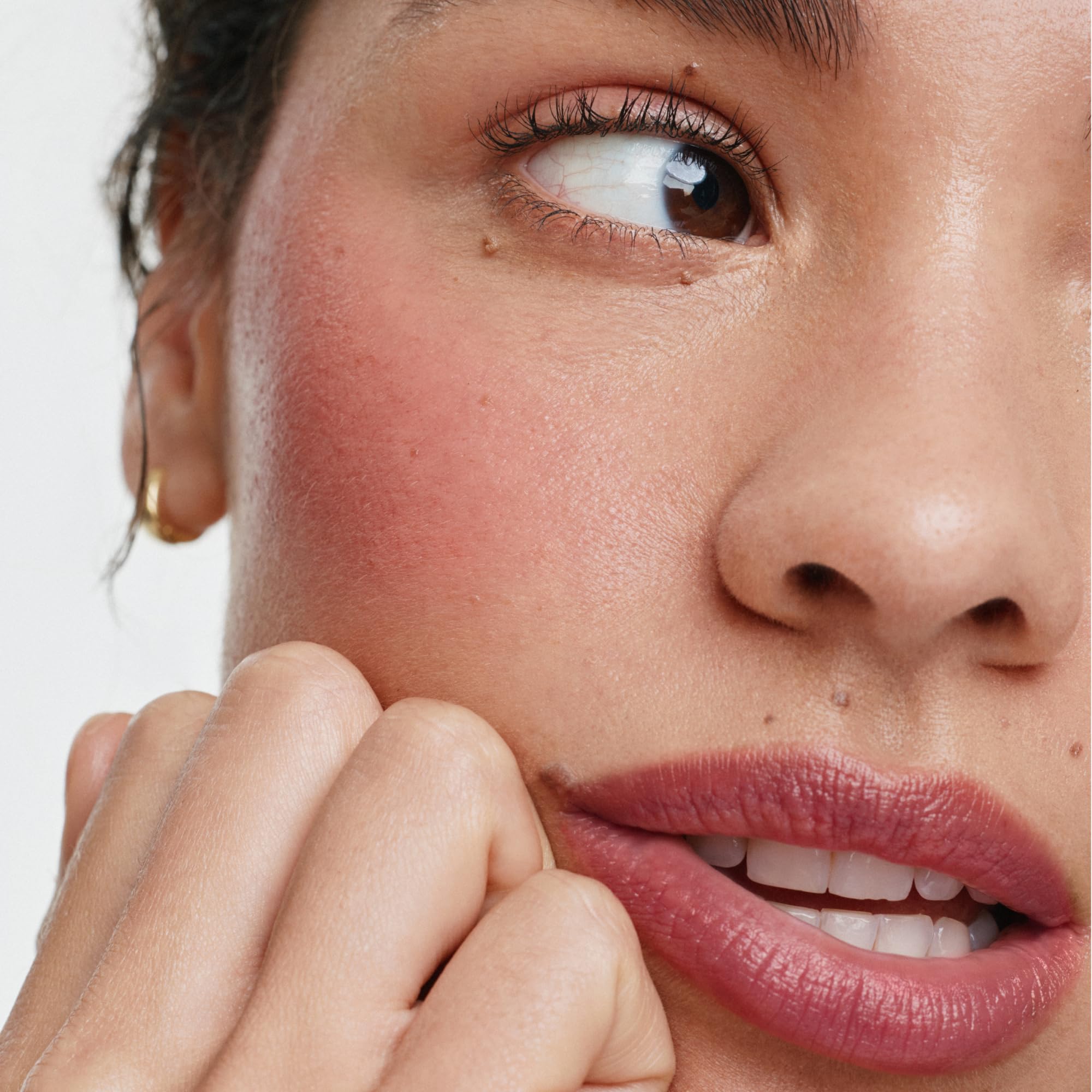ILIA multi-stick close-up showing pigment and luminous finish for natural glow
