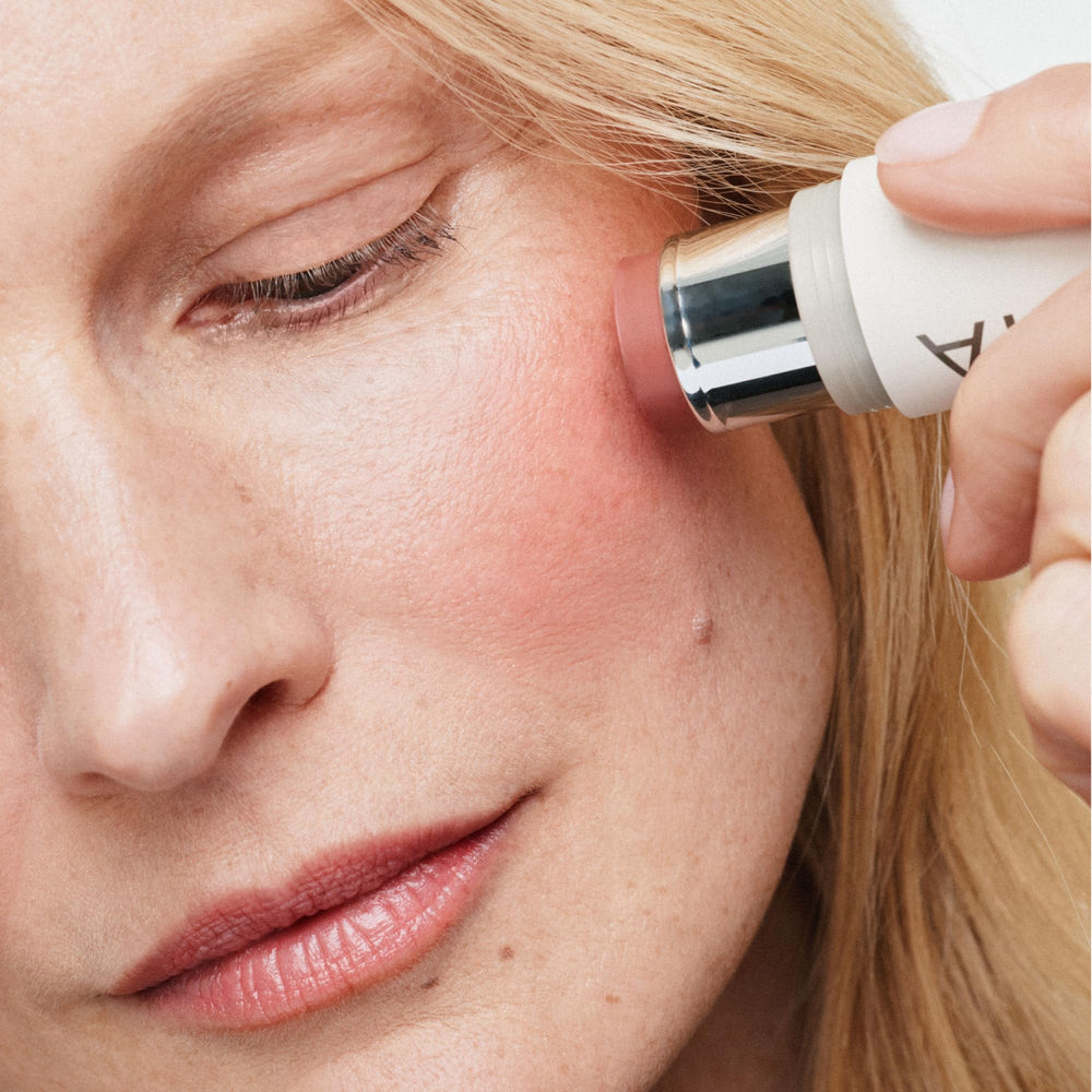 ILIA lip application closeup demonstrating natural, dewy tint