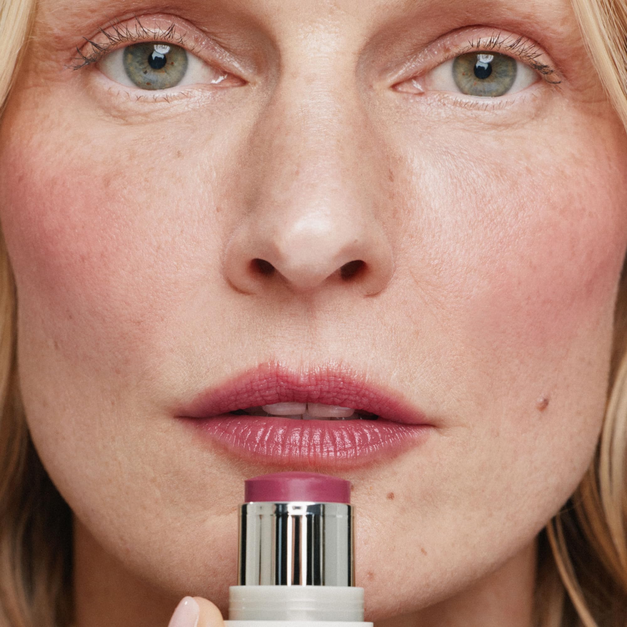ILIA multi-stick on lips showing tinted finish and hydrating comfort
