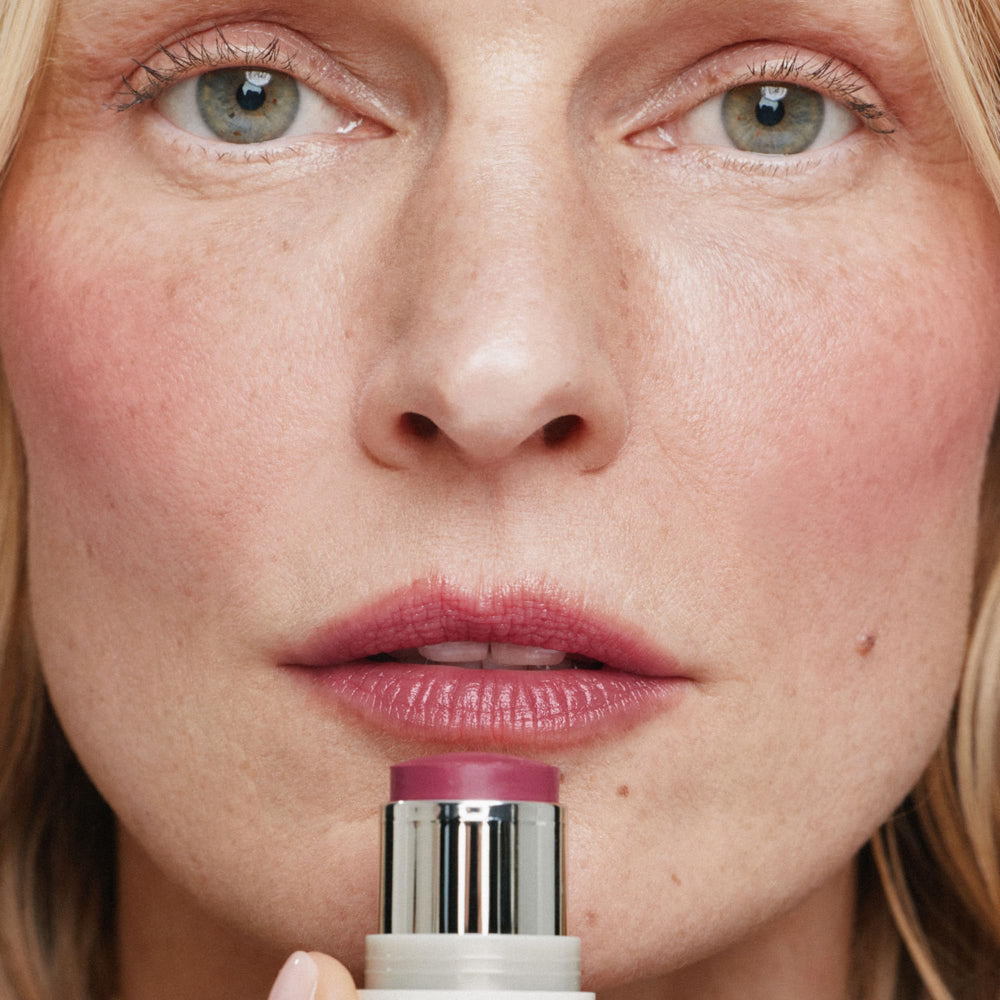 ILIA multi-stick on lips showing tinted finish and hydrating comfort