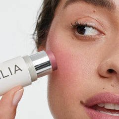 ILIA swatched on arm illustrating true mauve-rose payoff and buildability benefit